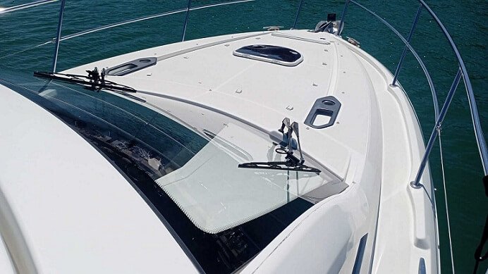 The bow of a motor boat shining after cleaning